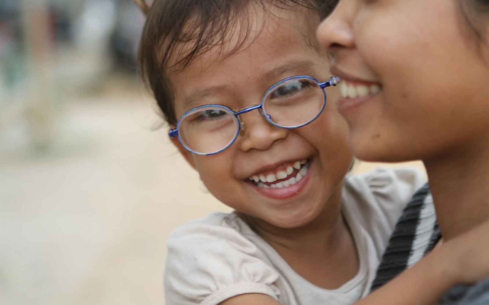 Cambodia Vann wearing glasses