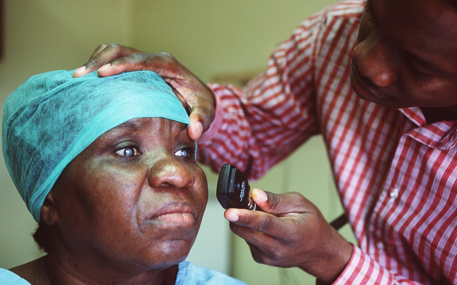Woman with cataract getting examined
