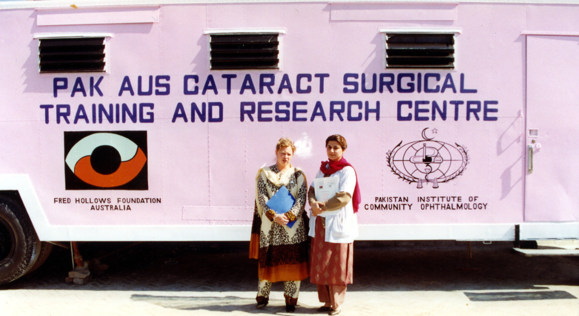 Training became a cornerstone of our approach. Here, Foundation staff stand beside a mobile cataract surgical training and research centre in Pakistan, taking skills and expertise closer to the people who needed them.