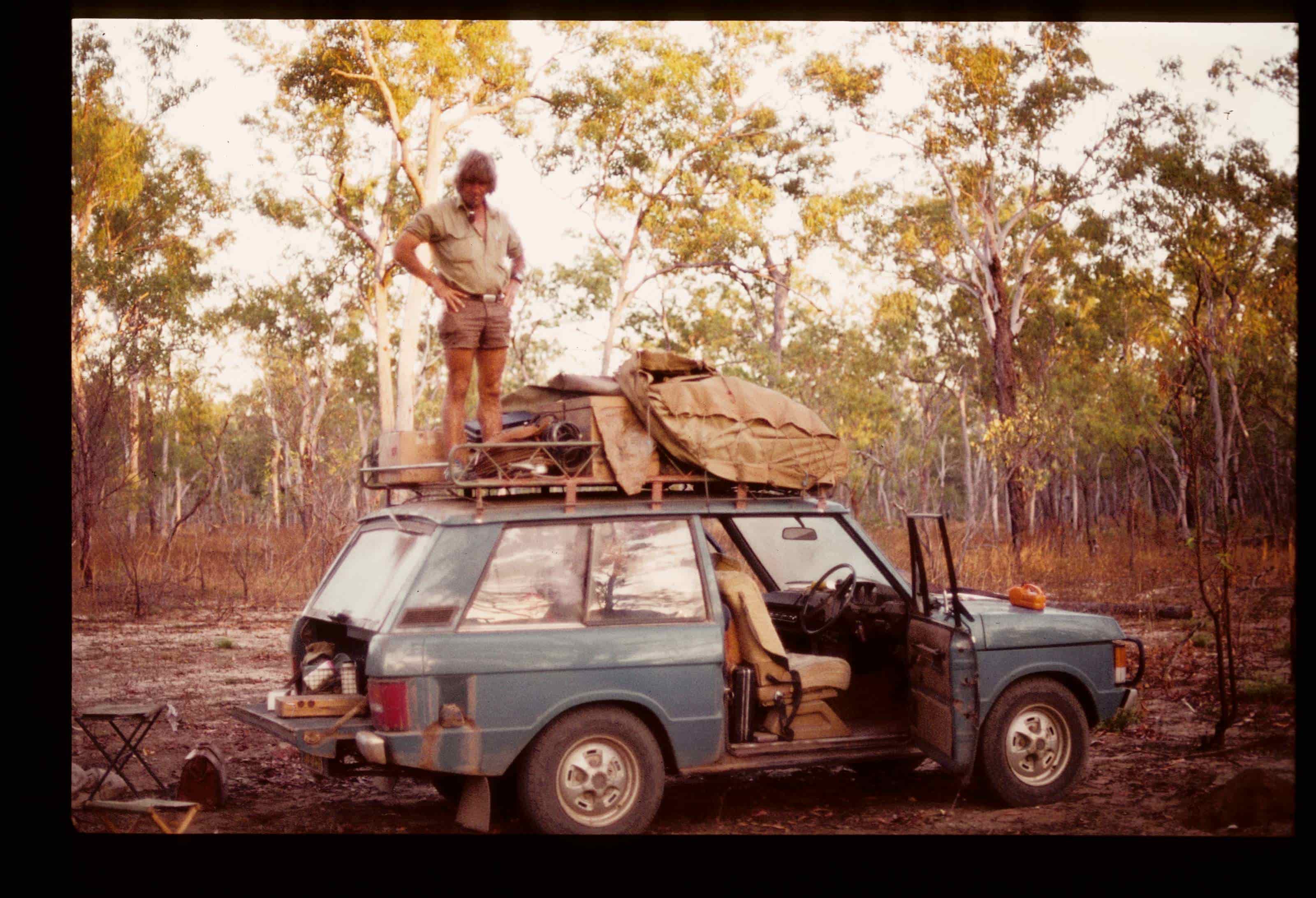 Fred standing on a Land Rover during The National Trachoma Program.