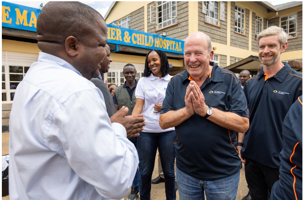 Michael Johnson visiting a program in Kenya