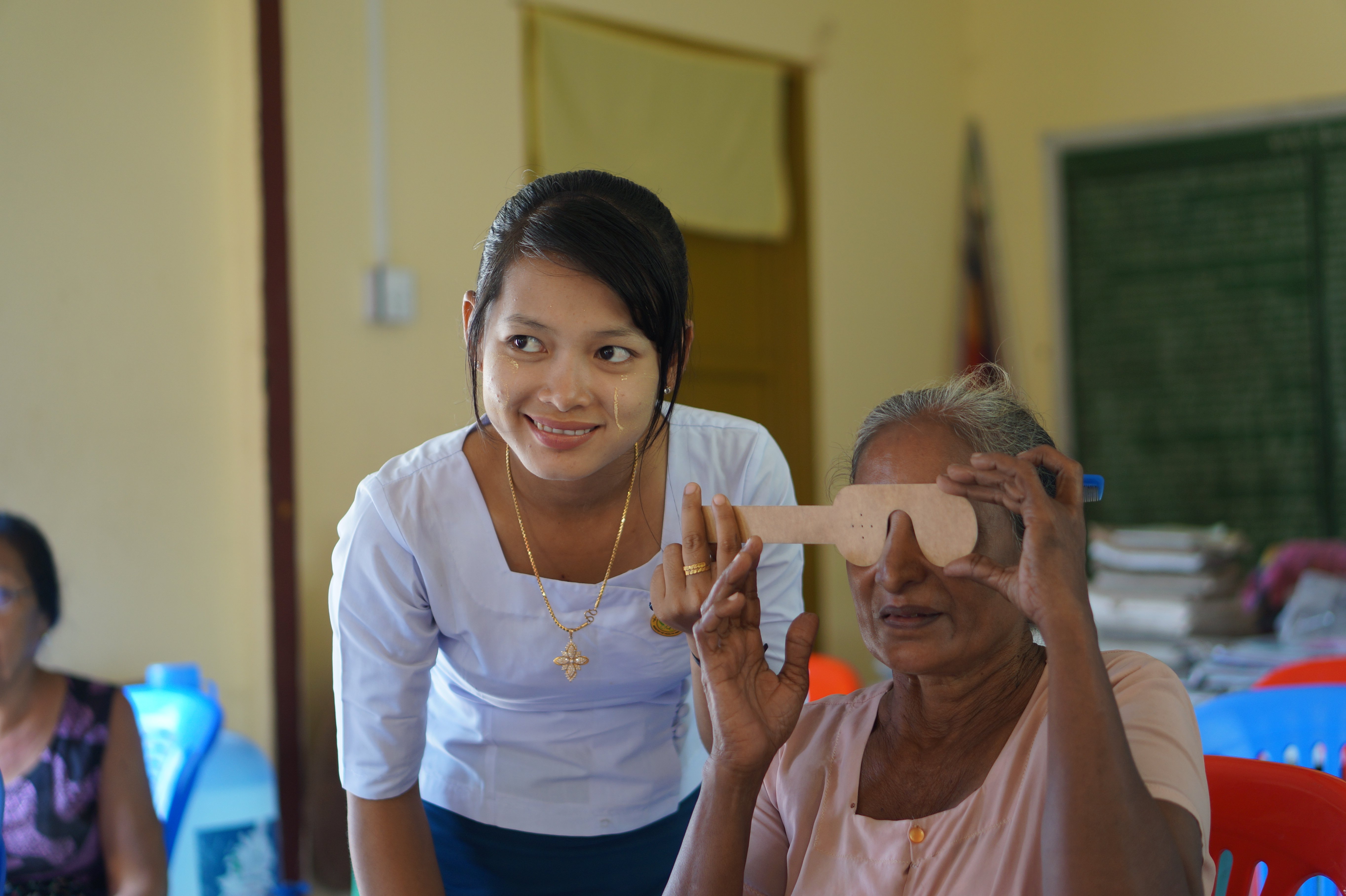 A woman gets her vision checked as part of Myanmar's national eye survey.
