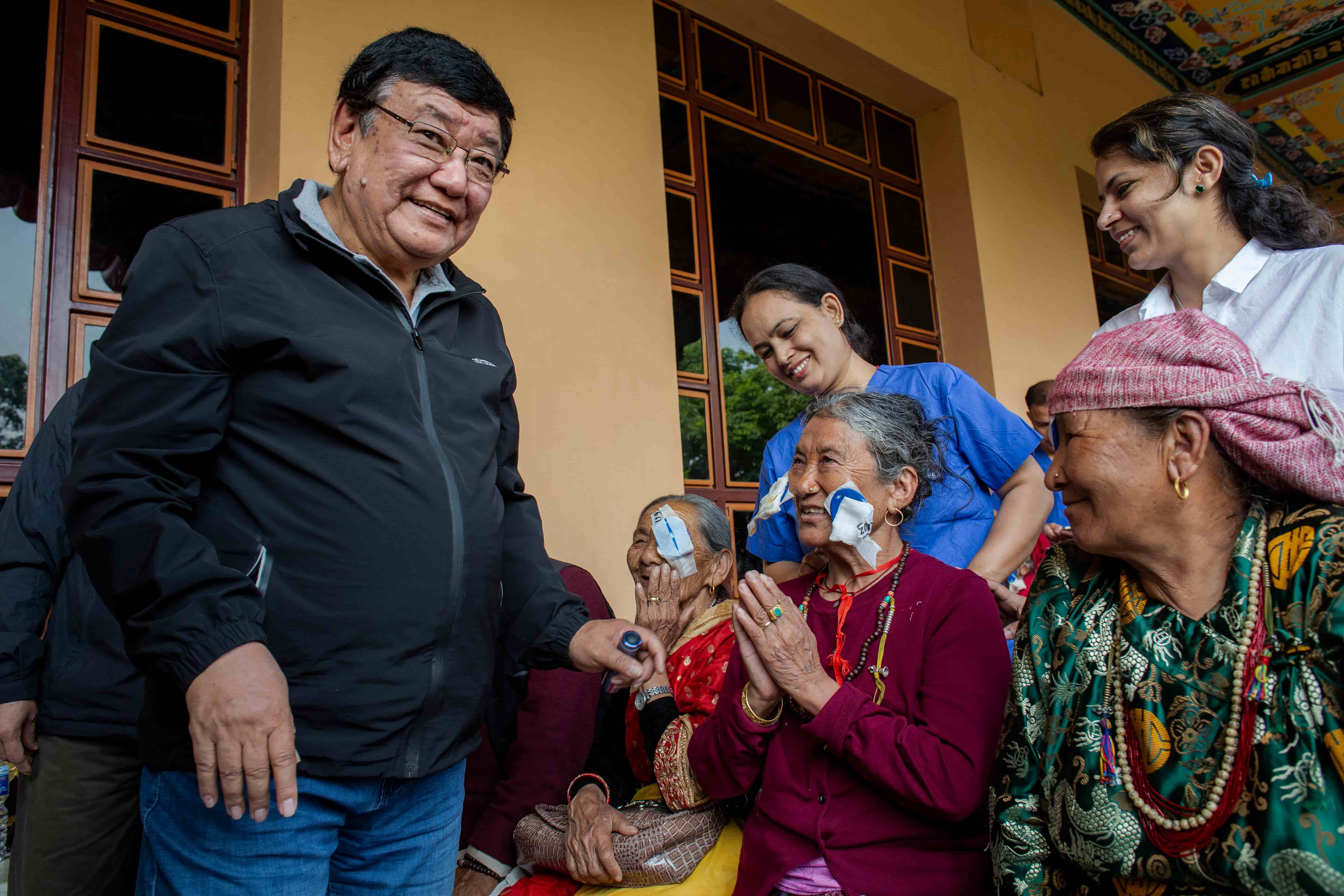 Dr Sanduk Ruit and the Tilganga team at the Pullahari Monastery Eye Camp in Kathmandu in May 2019, where hundreds of patients were screened and dozens received sight-restoring surgeries.