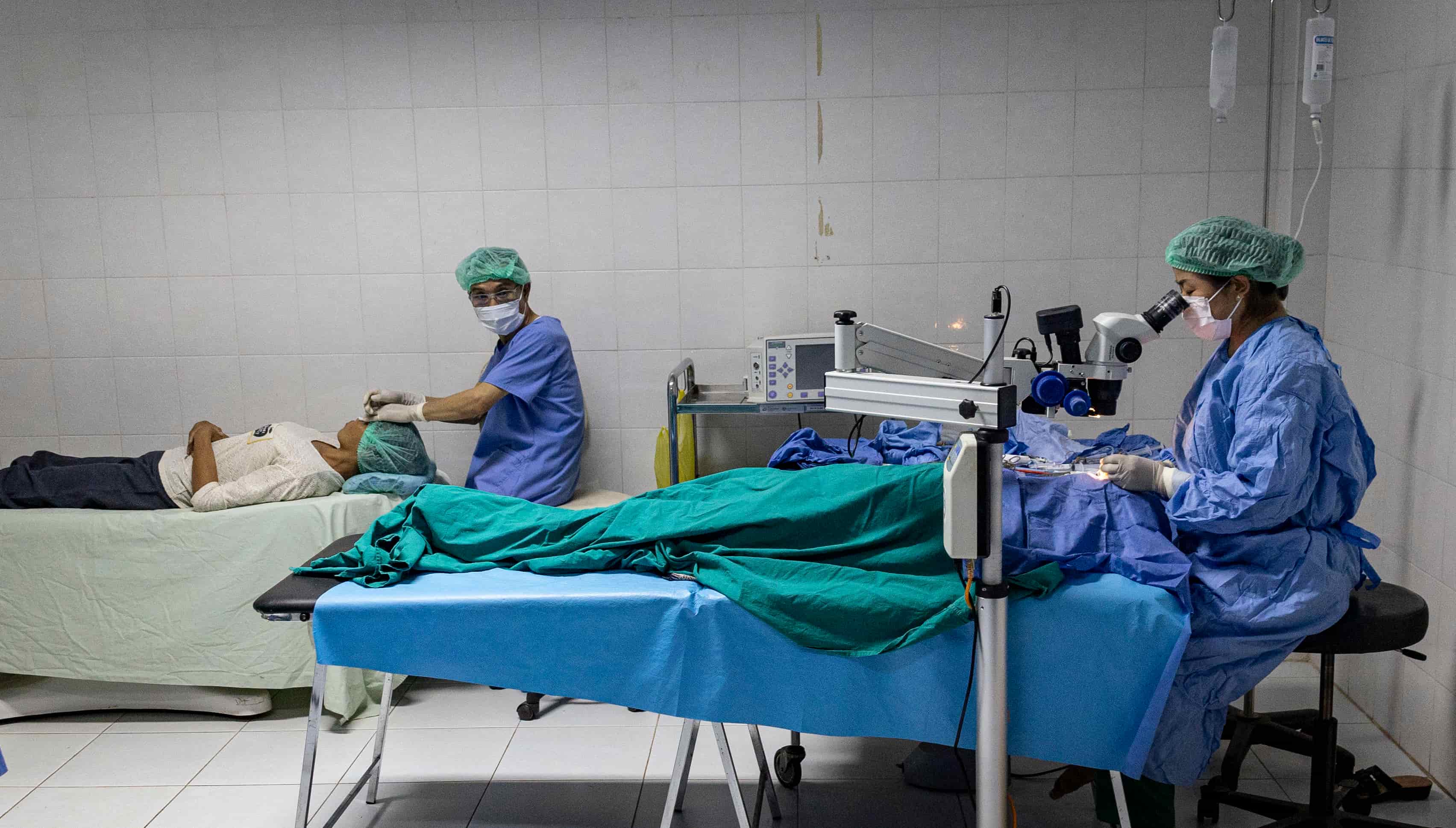 Yerng undergoes cataract surgery at Oudomxay Provincial Hospital in Laos, where Foundation-trained eye surgeon Dr Senglar Laosern is helping restore her sight and independence.