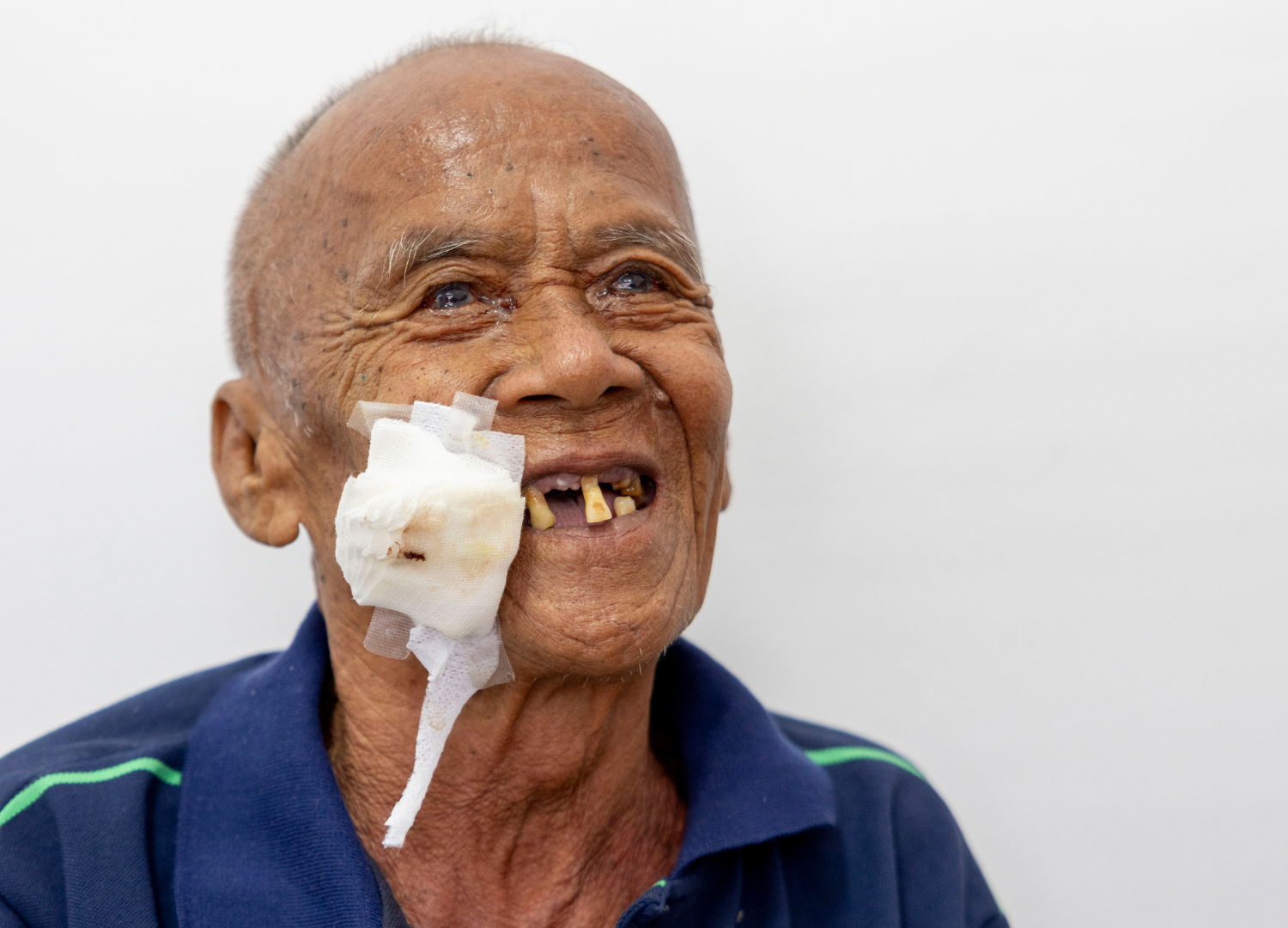 The moment you made possible. Thoung smiles after his eye patch is removed. He can see again. 
