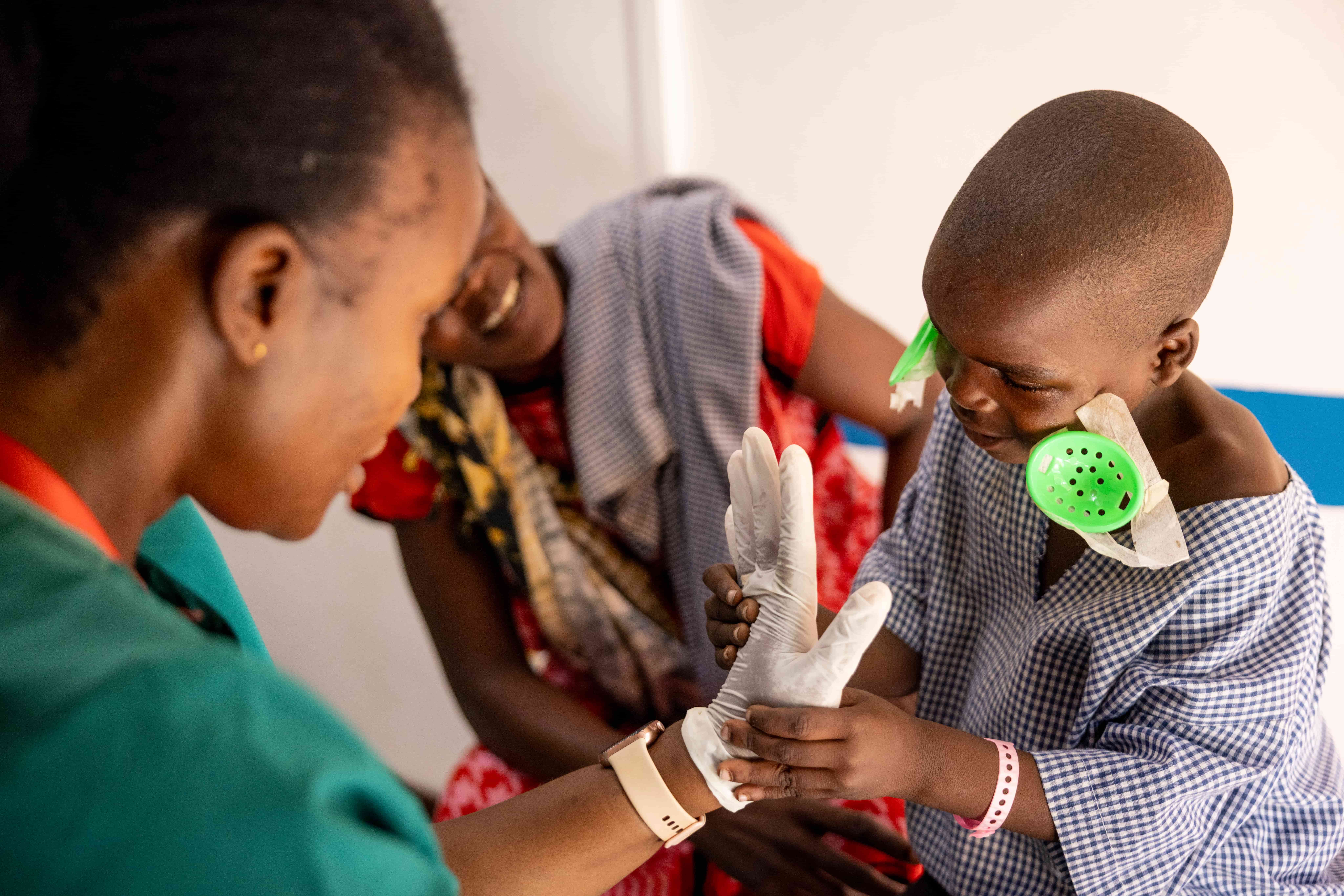 Jira seeing a hand for the first time after removing his eye patches.