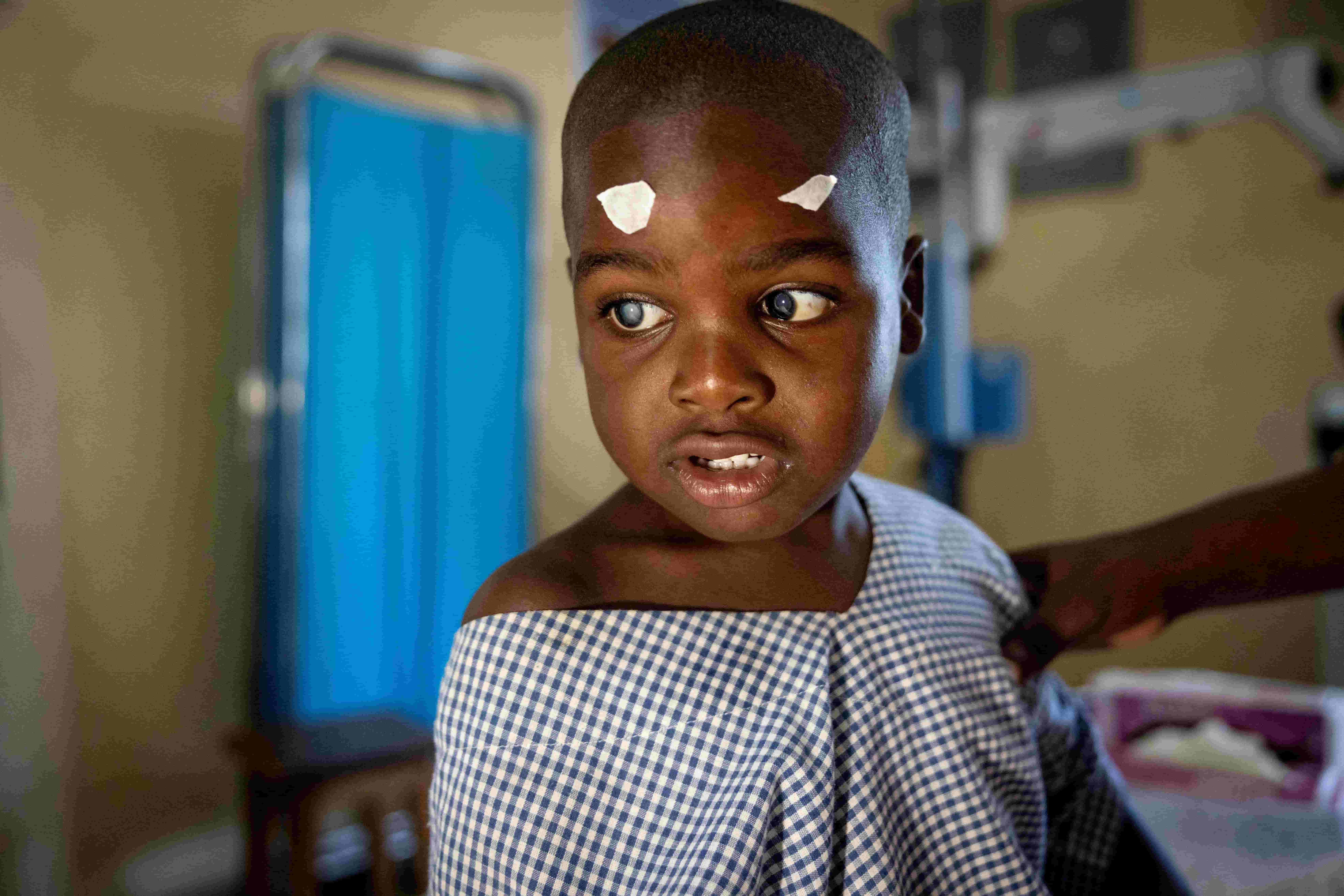 Jira in hospital in a gown, prepared for eye surgery