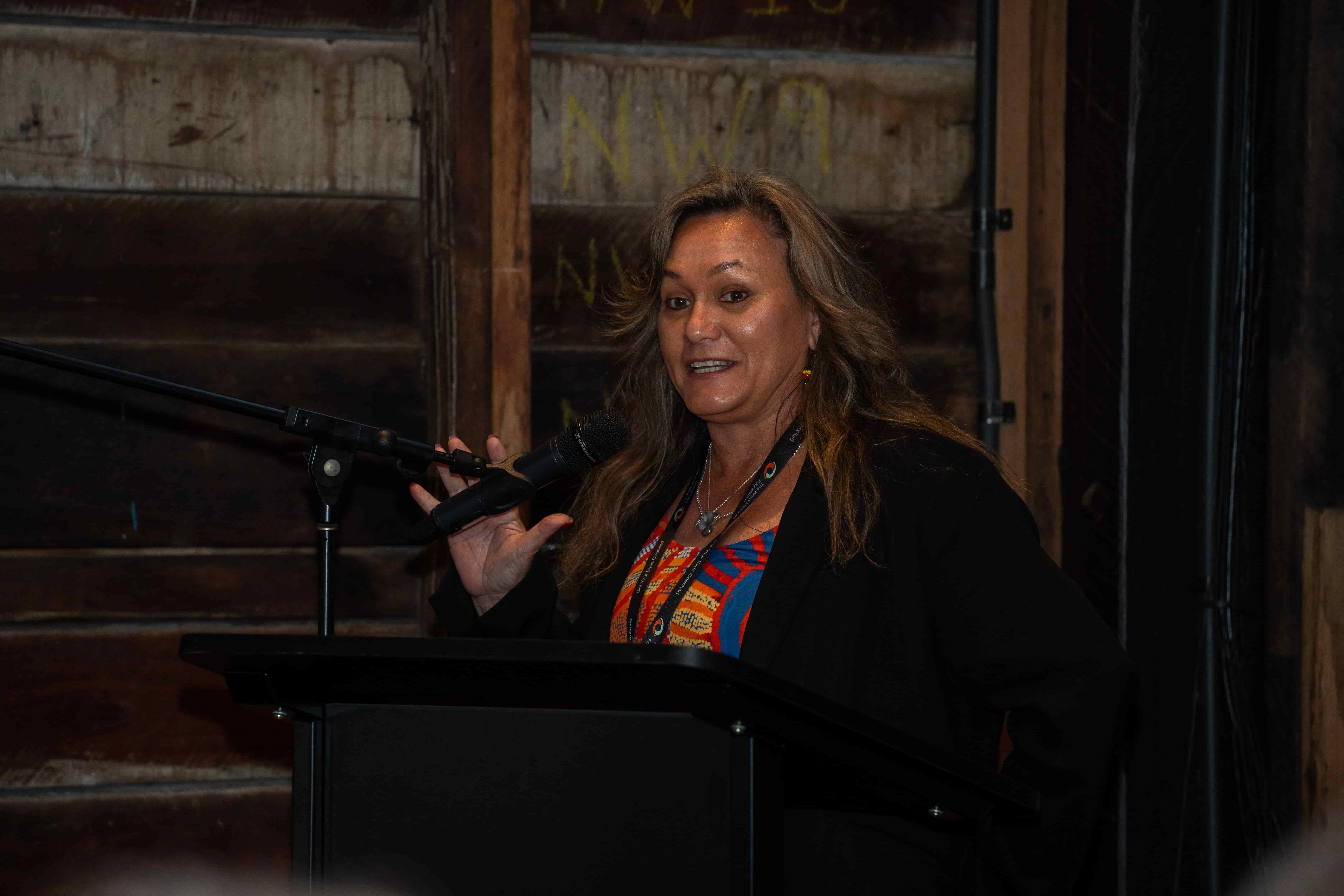 Closing the day, Jaki Adams powerfully reminds attendees that social justice is essential for achieving eye health equity for all.