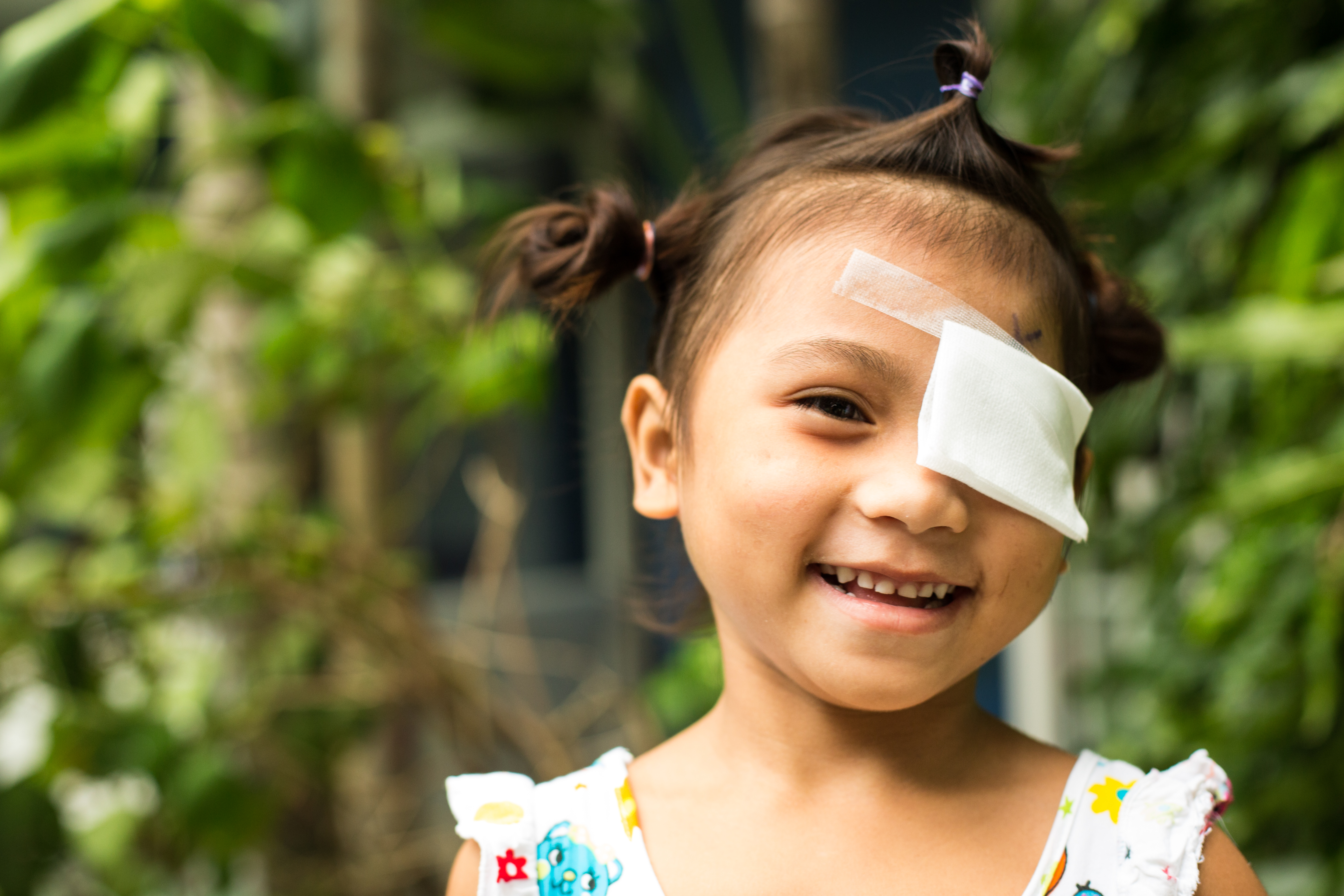 Young cataract patient Truat smiles after her surgery.