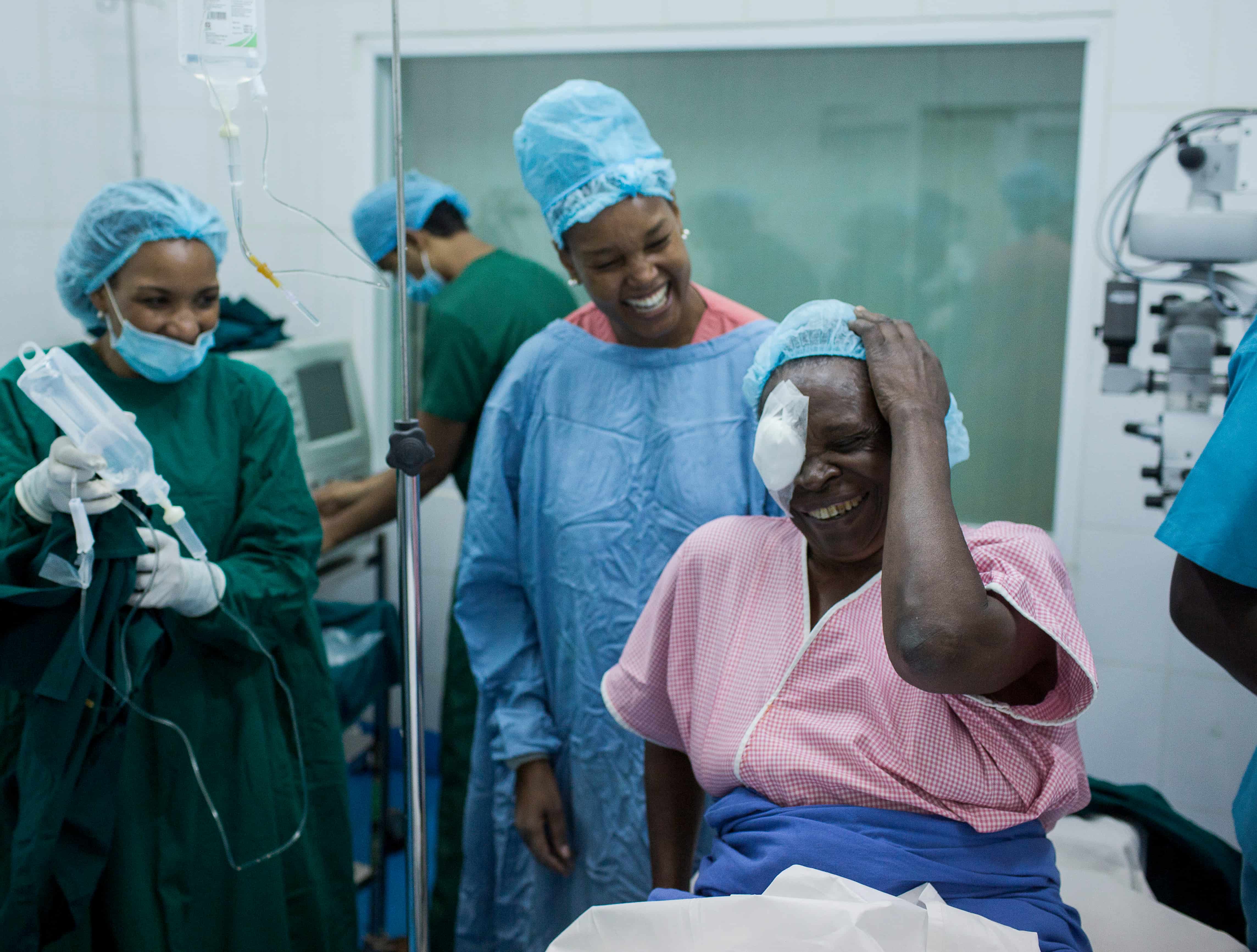 Dr Ciku Mathenge with Francine, whose sight was restored through cataract surgery after more than three years of blindness.