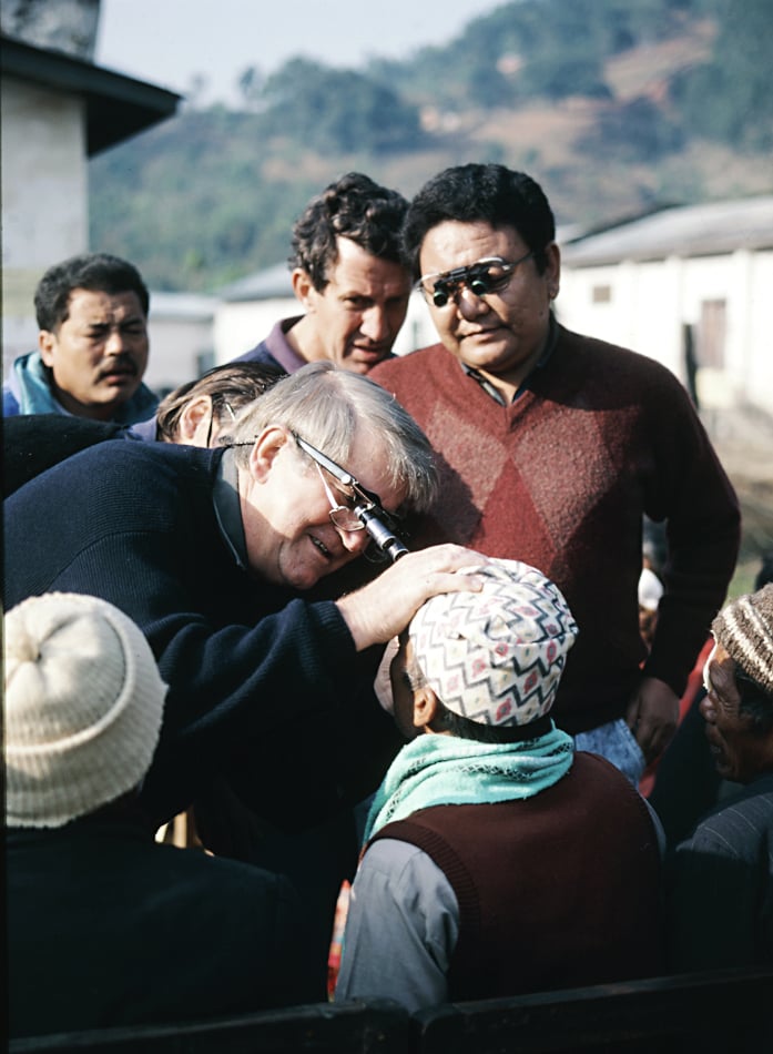 Dr Ruit and Fred Hollows examining a patient in Nepal, 1992.