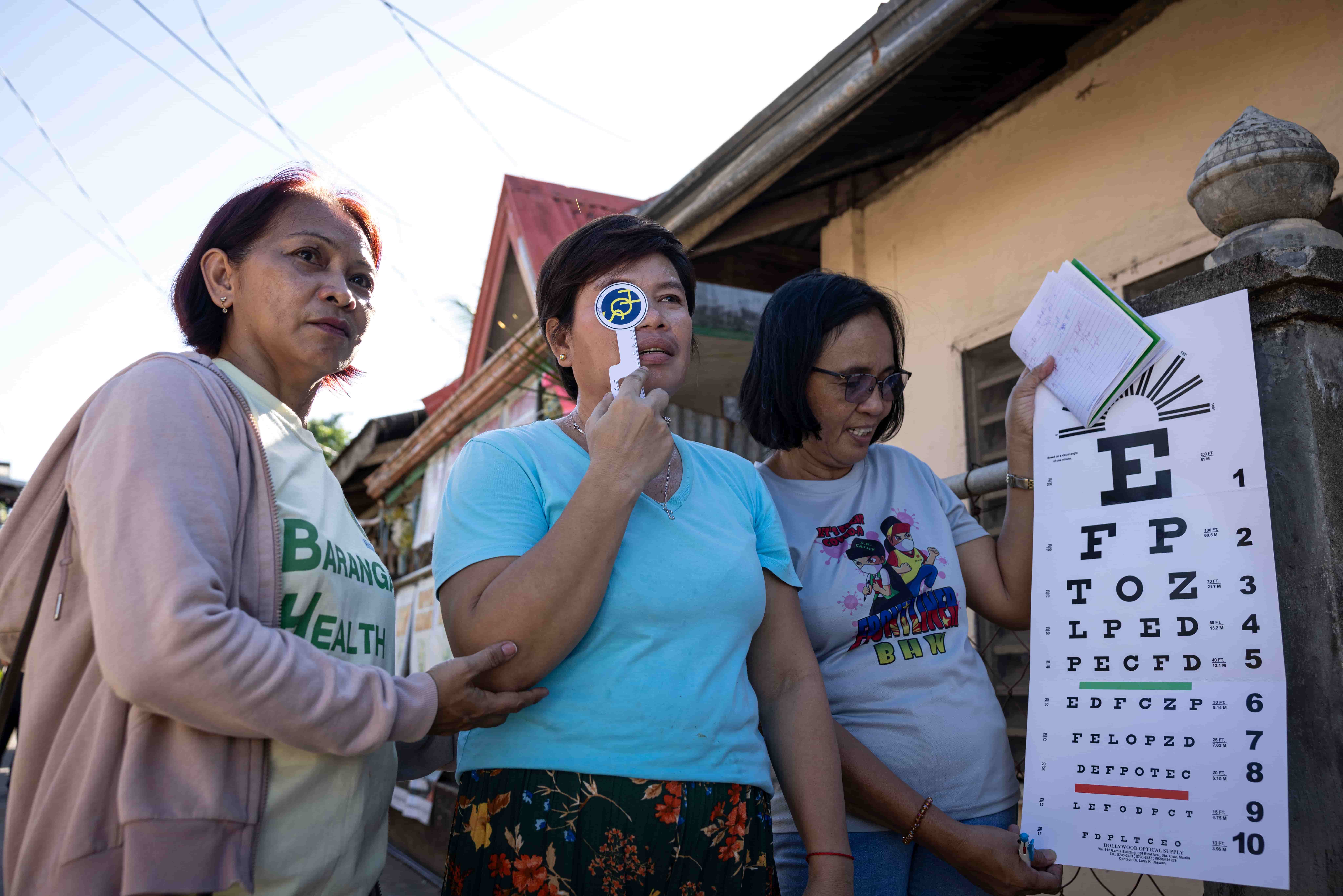 Barangay Health Workers take their skills to the streets of Ivisan, checking residents’ sight door by door.