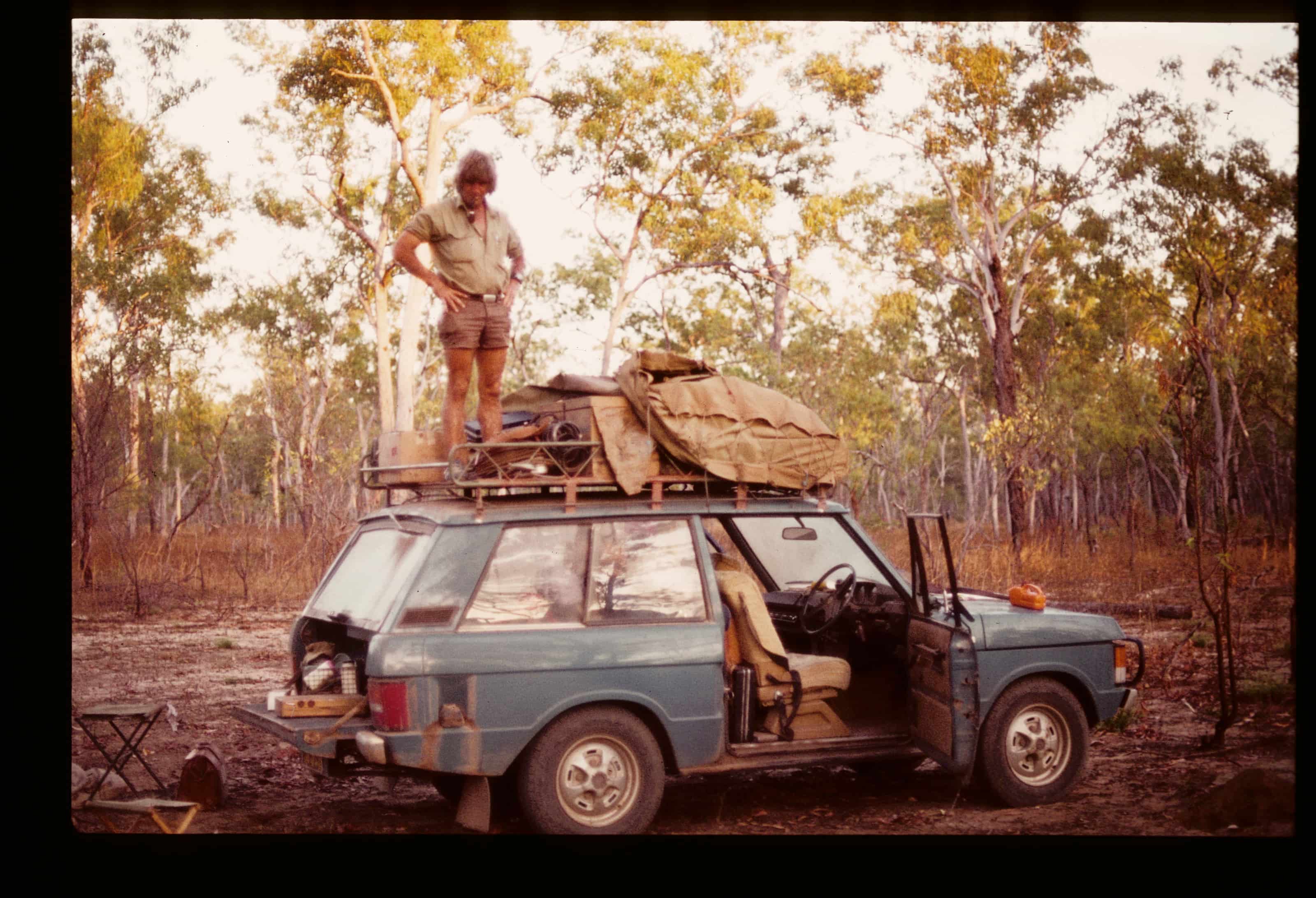Fred on top of a Land Rover in 1975, packed and ready as we set off to begin the National Trachoma and Eye Health Program. Photo credit: Leon Cebon 