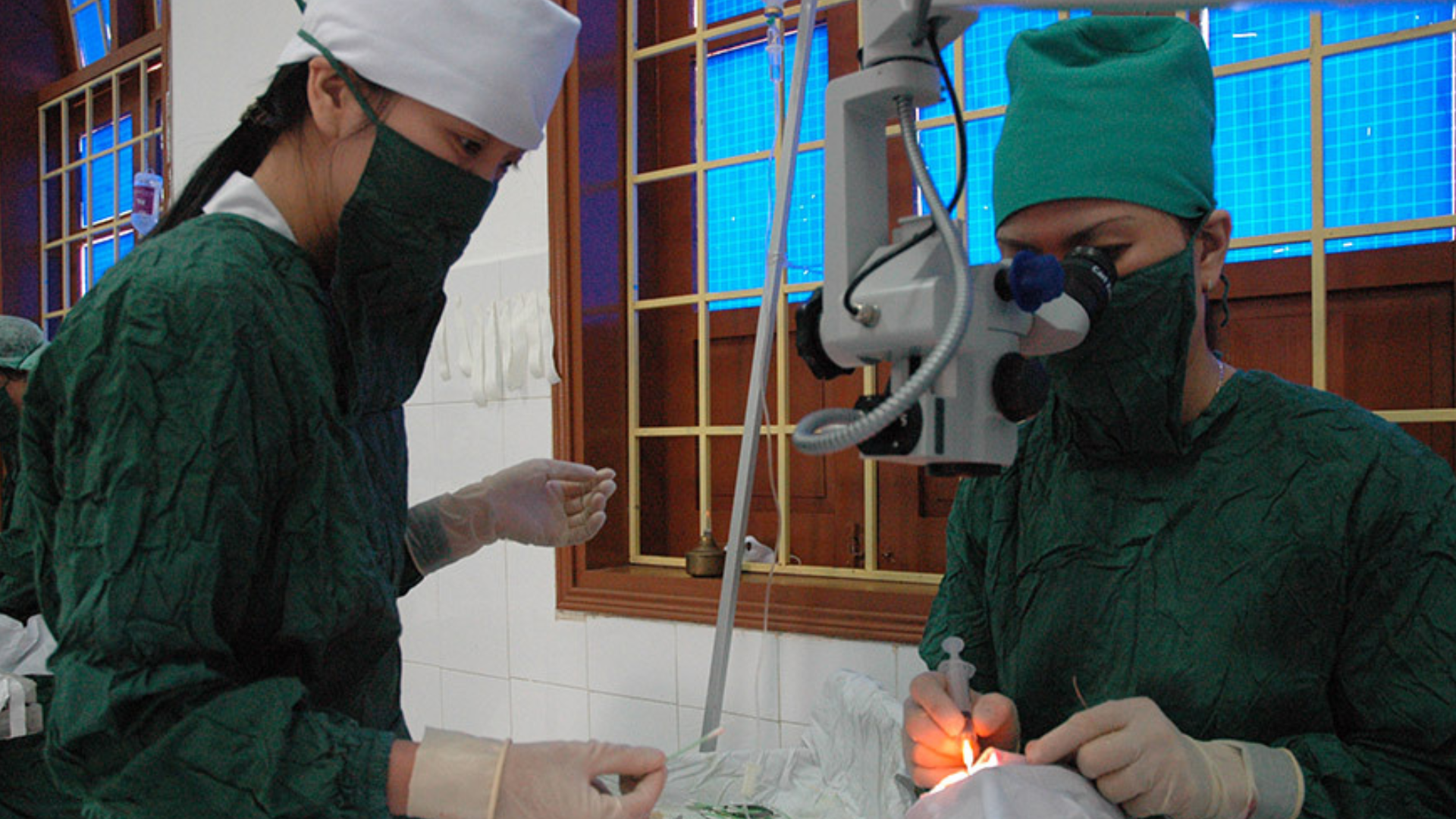 Surgeons in Vietnam working on a patient