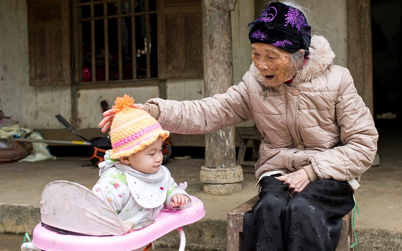 Vietnam Madam May with grandchild